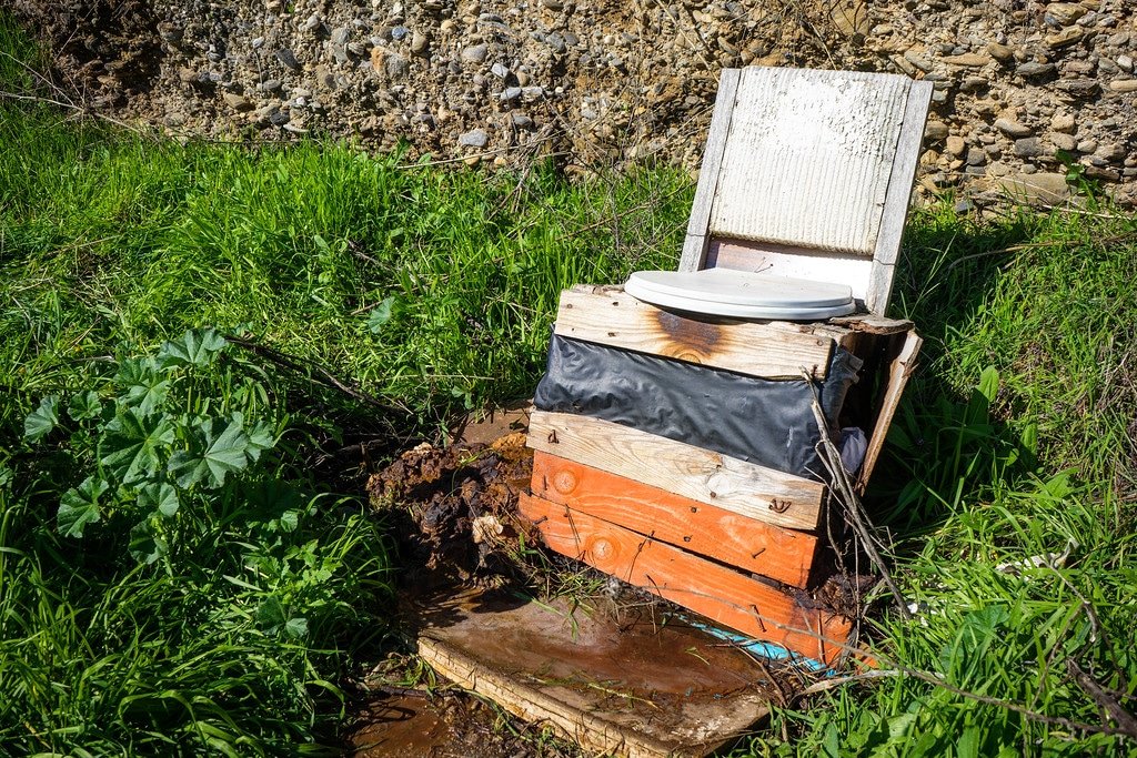 Overflowing outdoor community toilet Sacromonte Community Toilet Spain