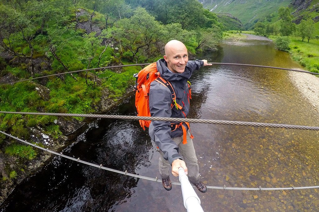 Crossing a Sketchy Wire Bridge Wire Bridge in the Highlands