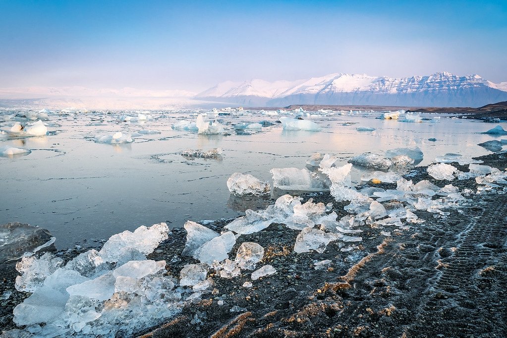 Ice Scattered over the Black Sand Jokulsarlon Glacier Black Sand Beach